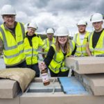 New distillery stakeholders raise a glass to key construction milestone