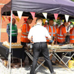 PERI employees mark 35 years serving the UK construction industry PERI hog roast