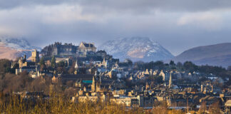 Panoramic view of the Stirling Castle and the old town with the Highlands at the background