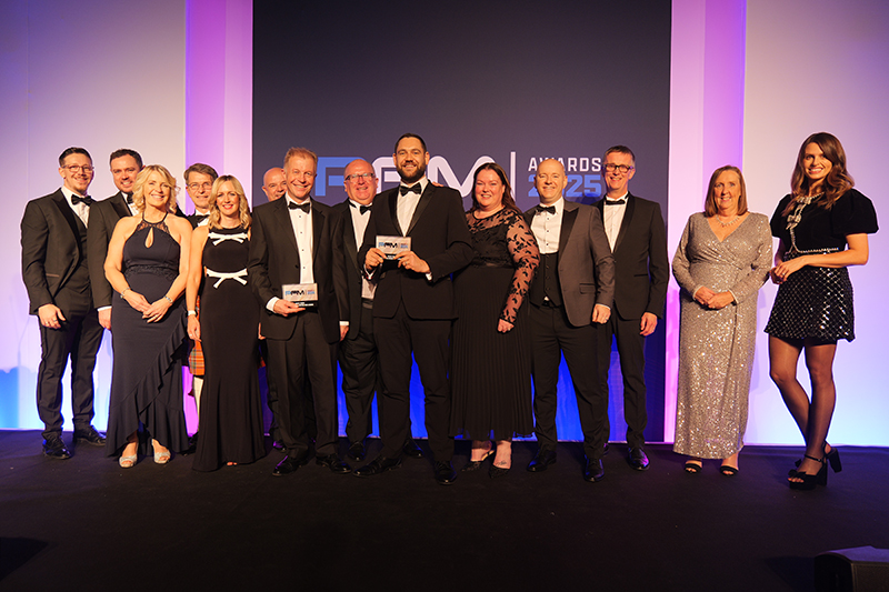 Robertson Facilities Management team collecting award