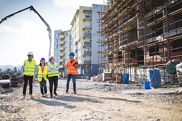 Construction workers on building site 