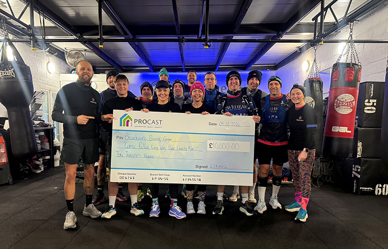 Charity challenge participants in boxing gym
