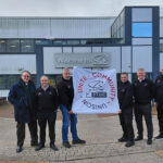 Glasgow construction workers tackle West Highland Way in hospice charity challenge Construction workers holding banner depicting West Highland Way charity trek