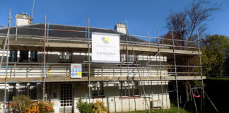 Home undergoing upgrade work with scaffolding around it