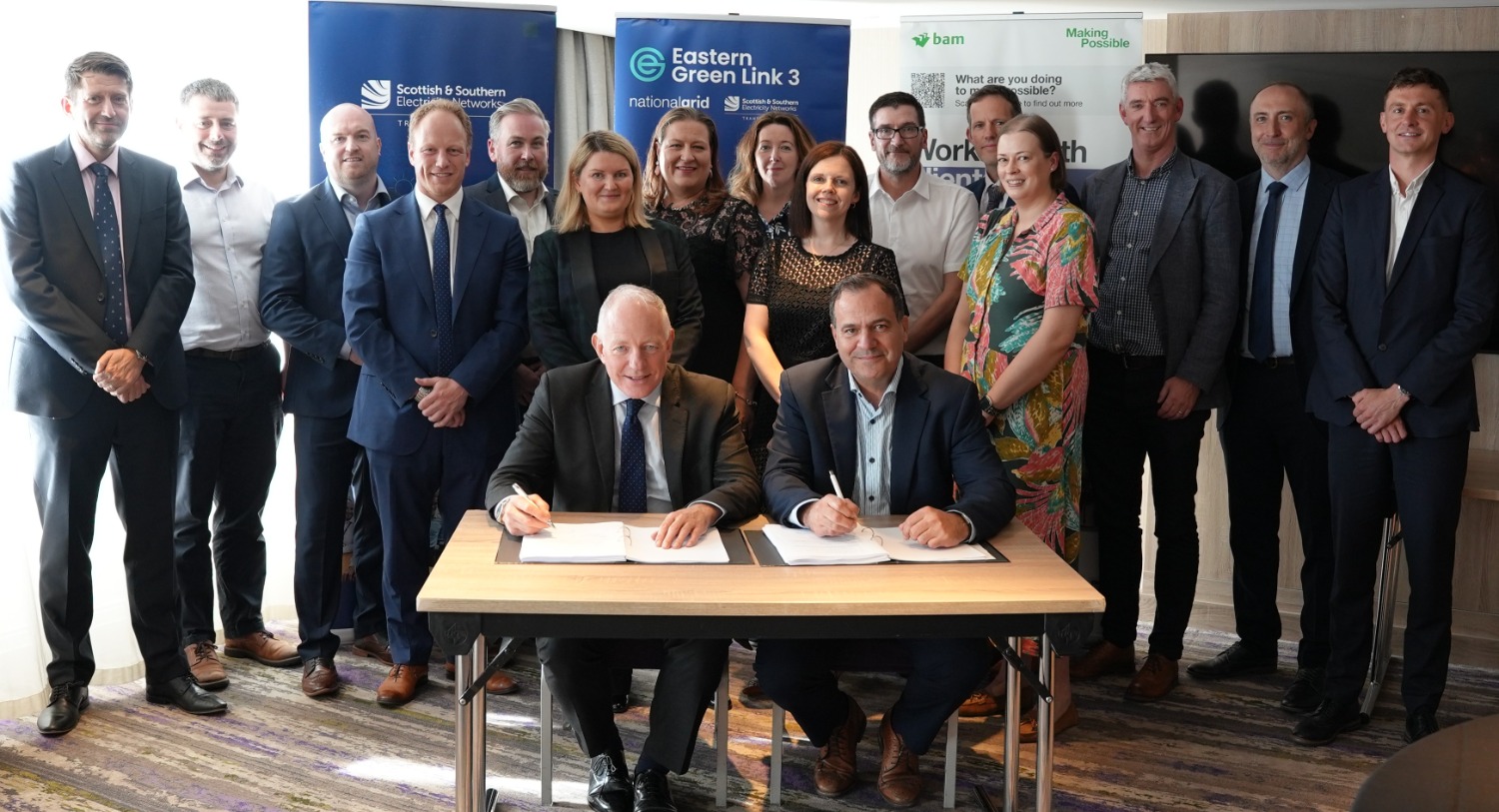 Representatives from SSEN Transmission and BAM gather for the signing of the Early Contractor Involvement agreement for EGL3, signed by SSEN Transmission’s Director of Offshore Delivery Sandy Mactaggart, and Adrian Collins, Director at BAM UK & Ireland.