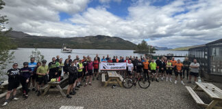 Charity cyclists at Loch Katrine