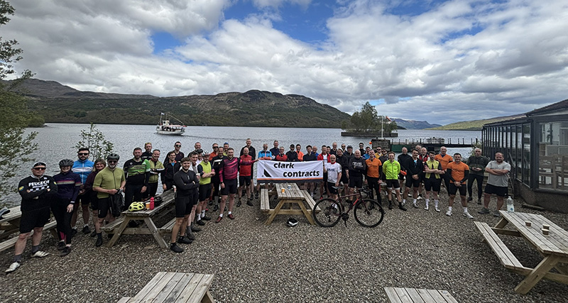 Charity cyclists at Loch Katrine