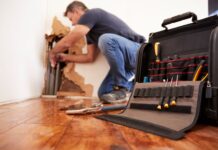 Dozens of firms appointed to £725m Scottish repairs framework Worker carrying out housing repairs