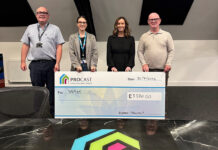 Large cheque being handed over following charity golf day