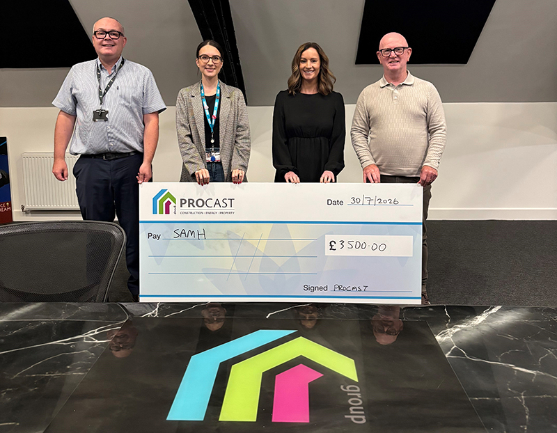Large cheque being handed over following charity golf day
