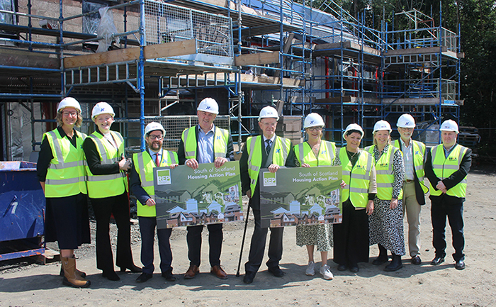 Housing minister Paul McLennan at JR Group's Fairhurst Drive site
