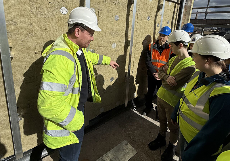 Andrew Yule on site with University of Glasgow students, showing them around the Lorne Hotel in Glasgow