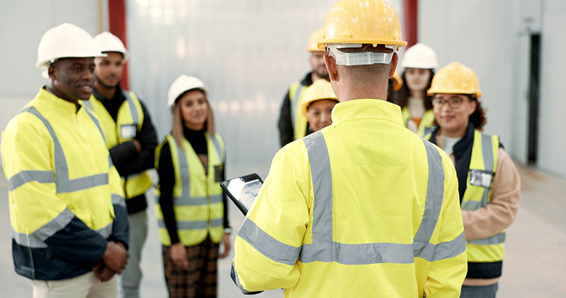 Construction workers in a meeting