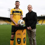 John Heaney Electrical nets increased sponsorship of Livingston FC Livingston captain Ryan McGowan with JHE managing director Mark Heaney