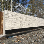 Sheet pile innovation helps mitigate Comrie flood risk Steel sheet pile walls in Comrie