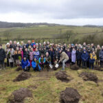 Group photo at Centenary Forest planting event
