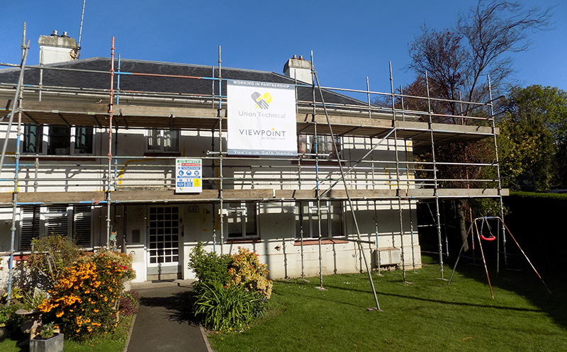 Home undergoing upgrade work with scaffolding around it