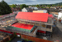 MMC build system featuring Wraptite® delivers lower membrane carbon solution Proctor's Wraptite membrane solution