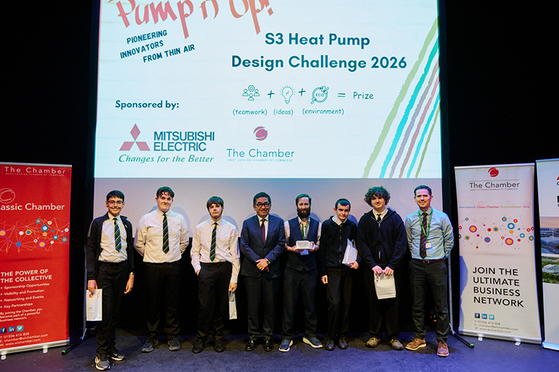 Winners of school heat pump challenge on stage