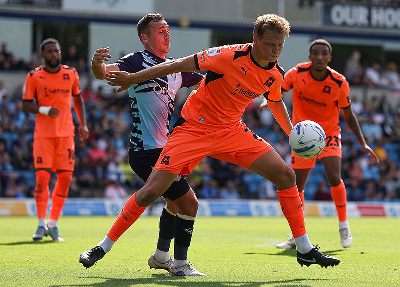 Plymouth wearing their new strip with Lighthouse Charity logo