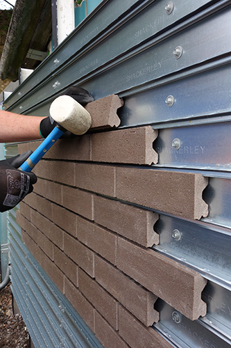 Fixed brick cladding system