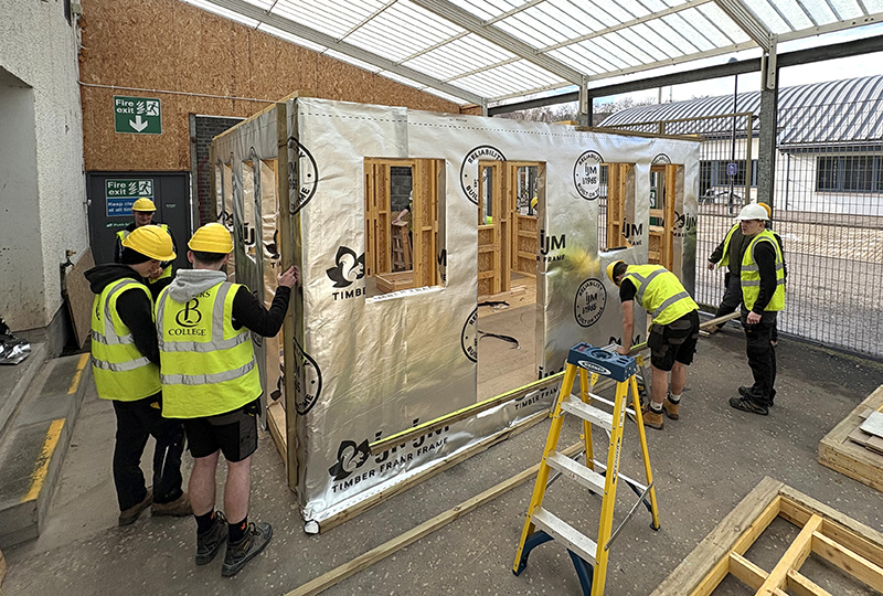College students carrying out construction techniques