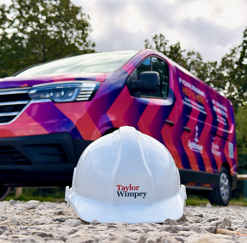 Lighthouse Charity van and Taylor Wimpey hard hat
