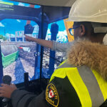 RJ McLeod investment helps expand Construction Aware initiative Young person on construction simulator