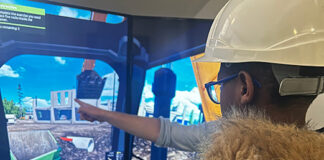 Young person on construction simulator