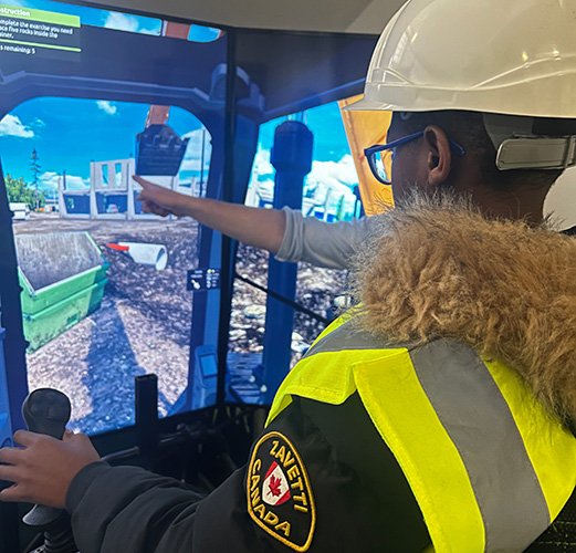 Young person on construction simulator