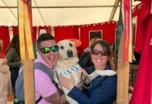 Construction industry urged to step up mental health focus Construction director with his wife and dog marking Mental Health Awareness Month